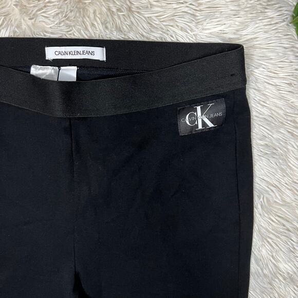 Calvin Klein Jeans| Women's black stretchy athletic biker shorts - Picture 3 of 11
